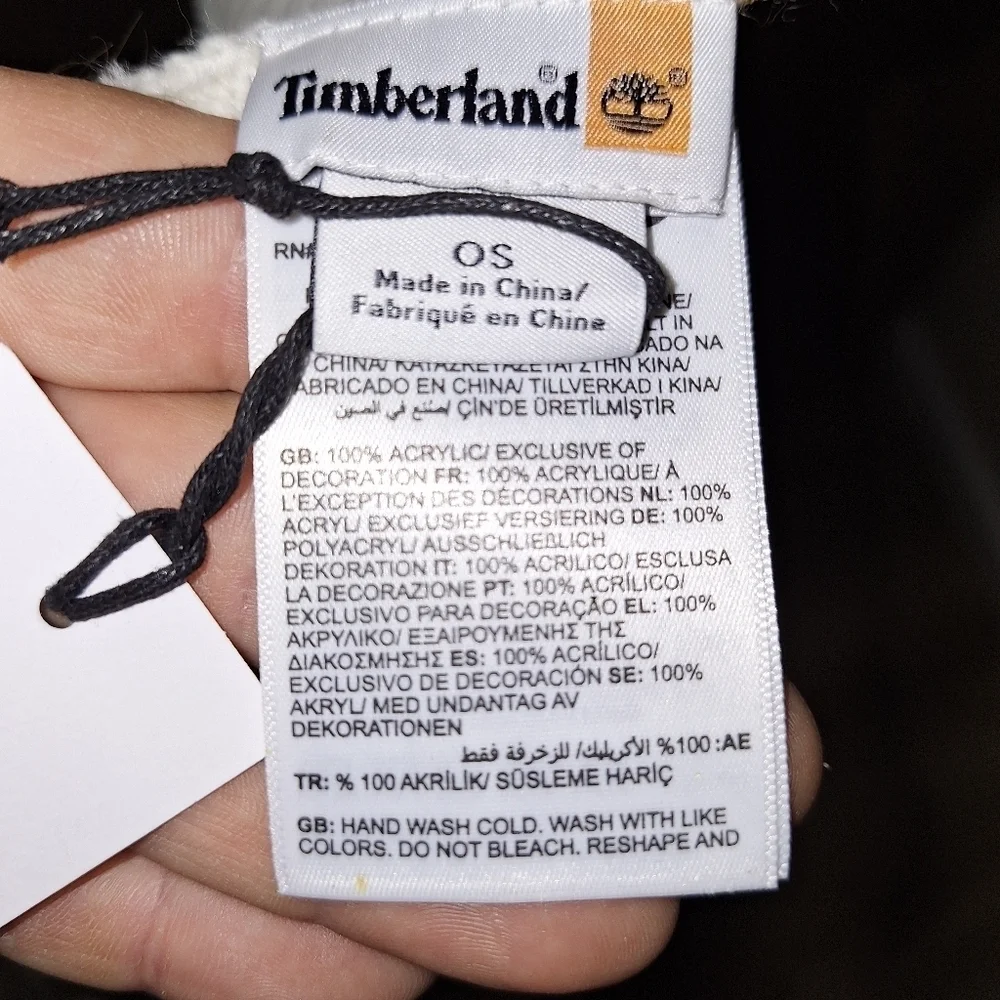 A Timberland white/ lt. brown plaid scarf that's 67